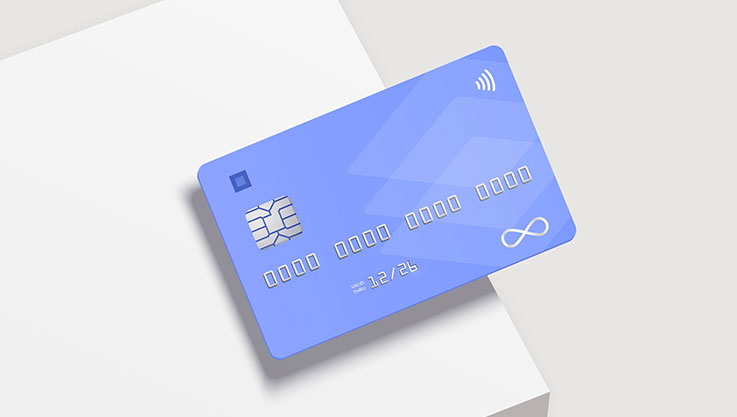 An illustration two blue credit cards on a grey background.